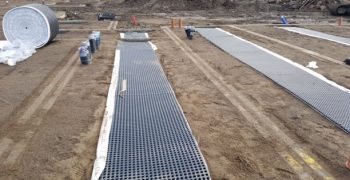 Laqndflex Gasflow Geocomposite install and roll